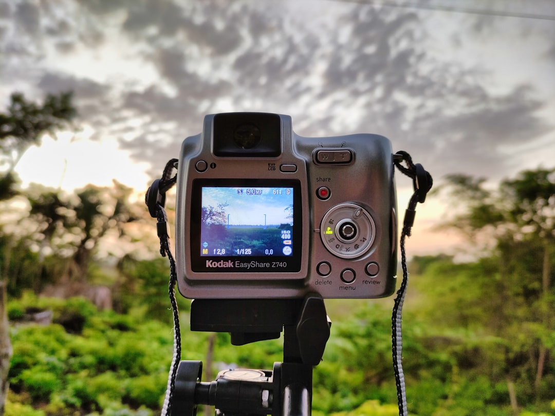 Digital camera recording video outdoors in bright sunlight, at risk of overheating